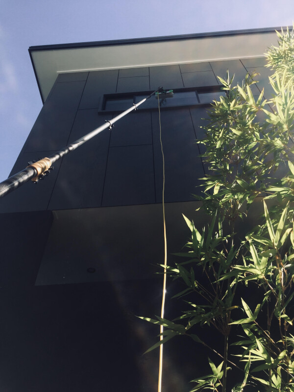 waterfed pole system cleans high to reach external windows dries clear