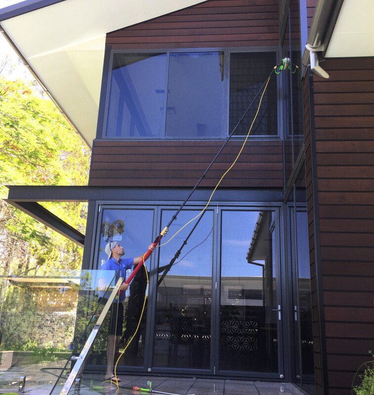 waterfed pole and pure water system cleaning external windows at two storey home